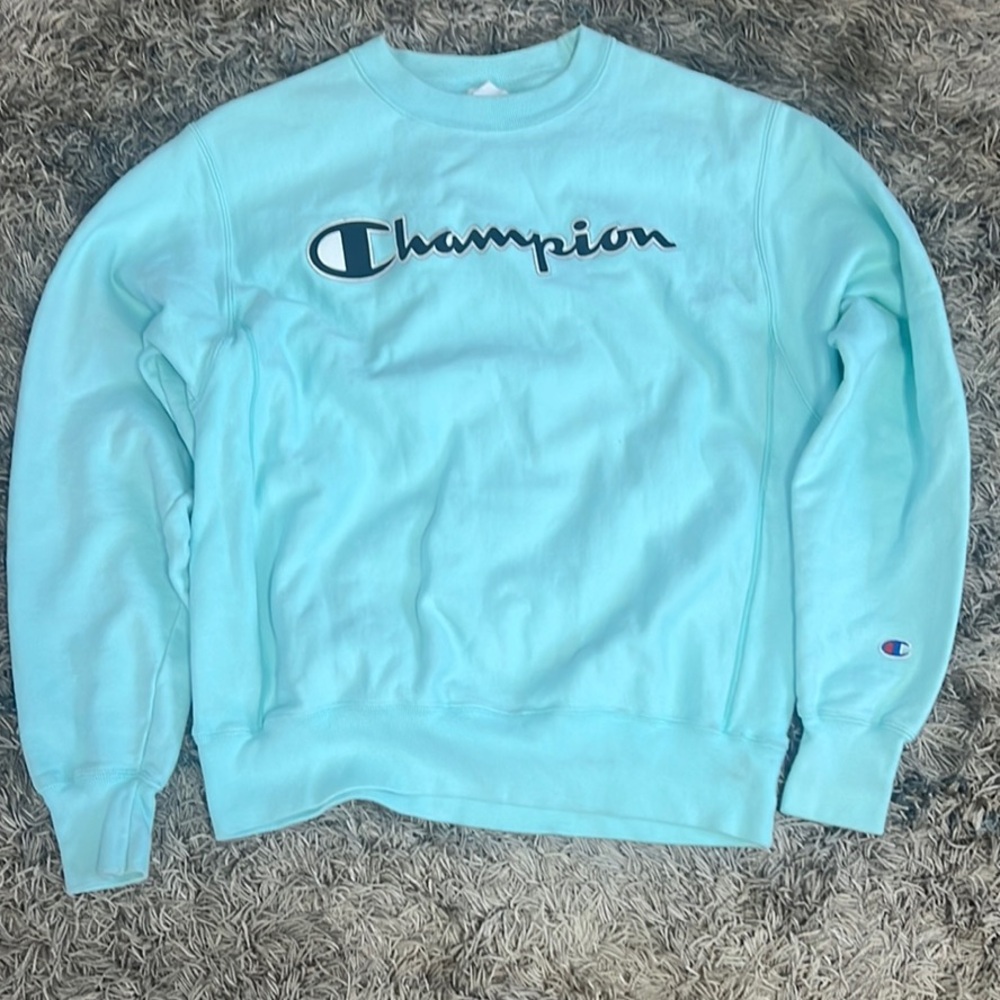 Champions: Womens Light Blue Sweatshirt